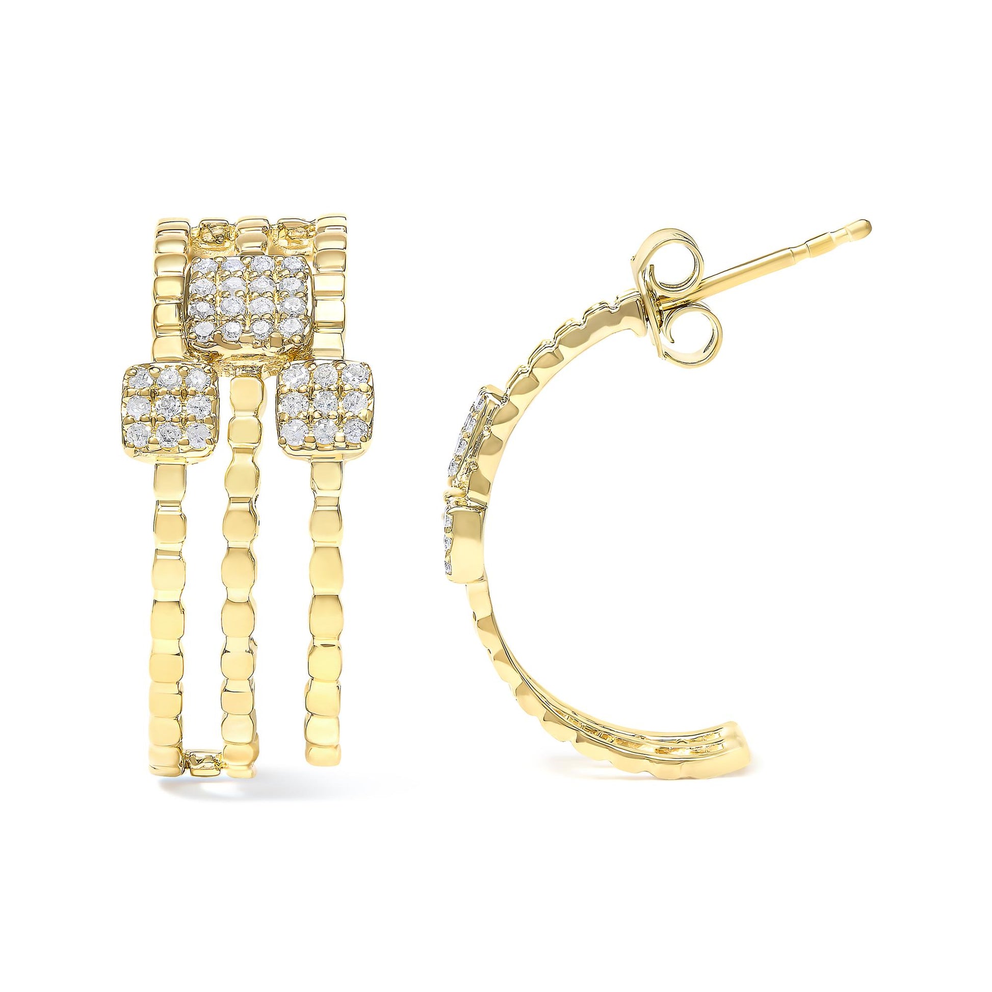 Front and side view of yellow metal earrings with triple band design and three square clusters of white gemstones in prong settings, shown against a white background.