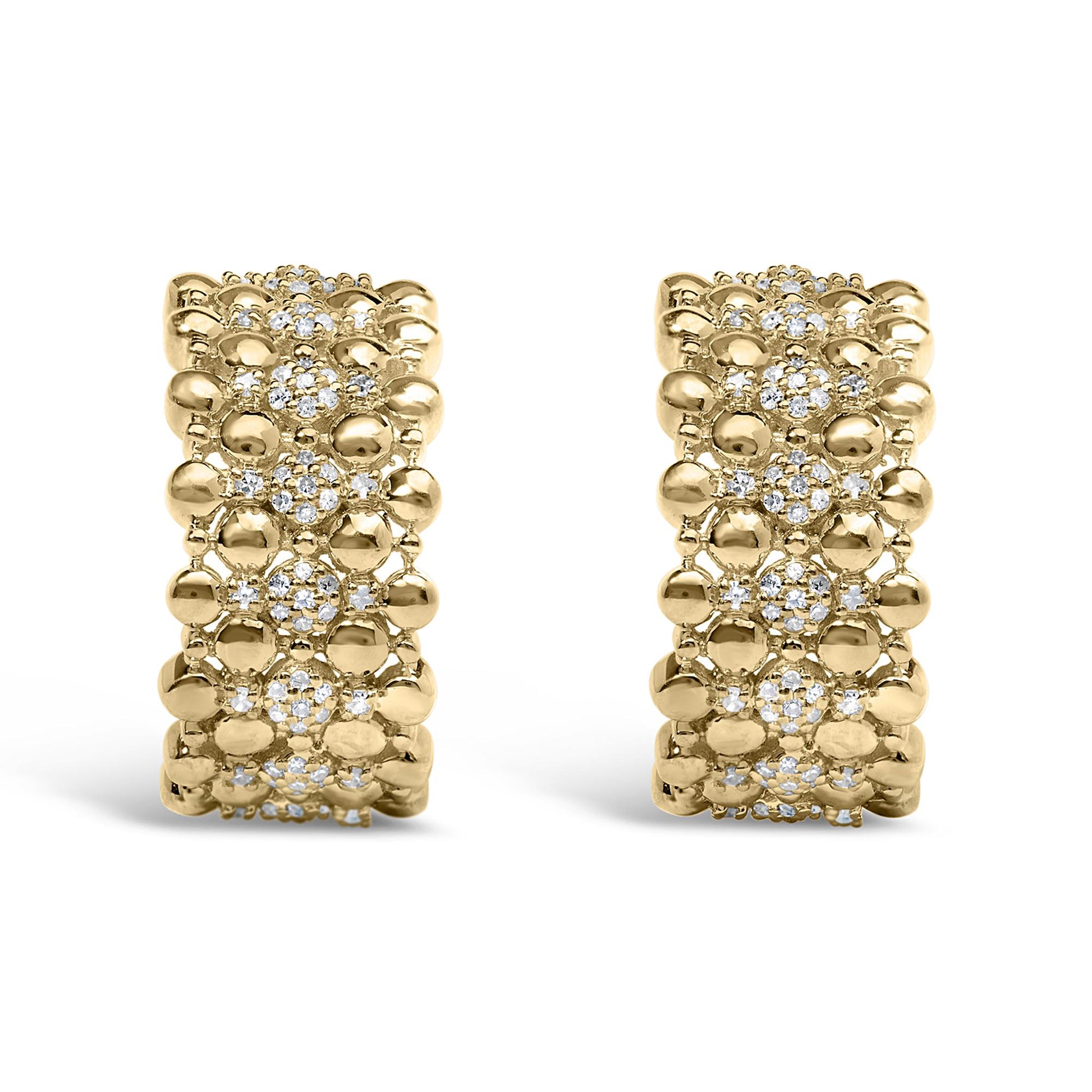 Close-up front view of a pair of yellow metal earrings featuring clusters of round white gemstones in prong settings surrounded by smooth metal beads.