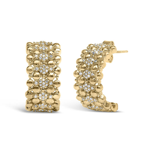 Front and side view of yellow metal earrings with cluster of white round gemstones in prong setting.