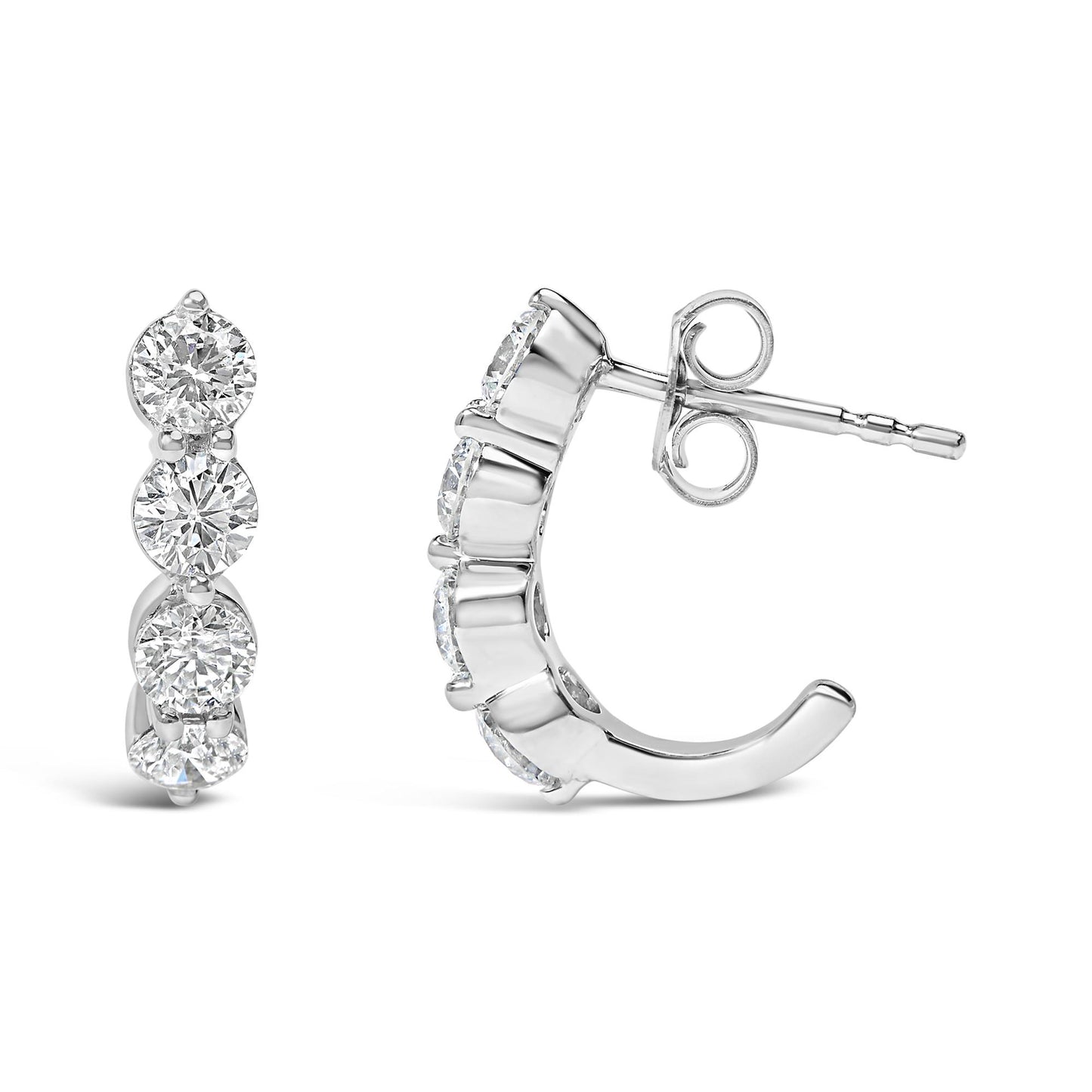 Front and side angled view of white metal earrings featuring round white gemstones in prong settings arranged vertically.