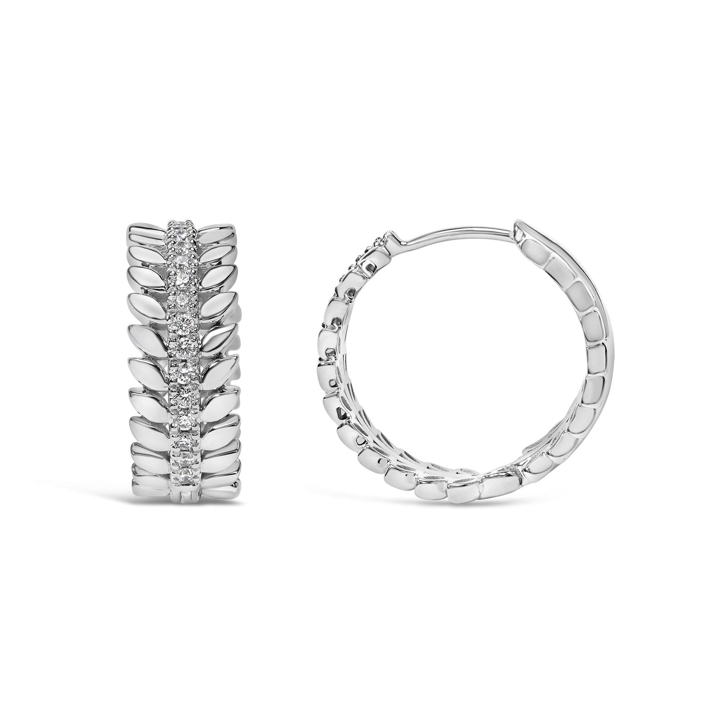 Front and side angled view of white metal hoop earrings with a row of round white gemstones in a prong setting along the center.