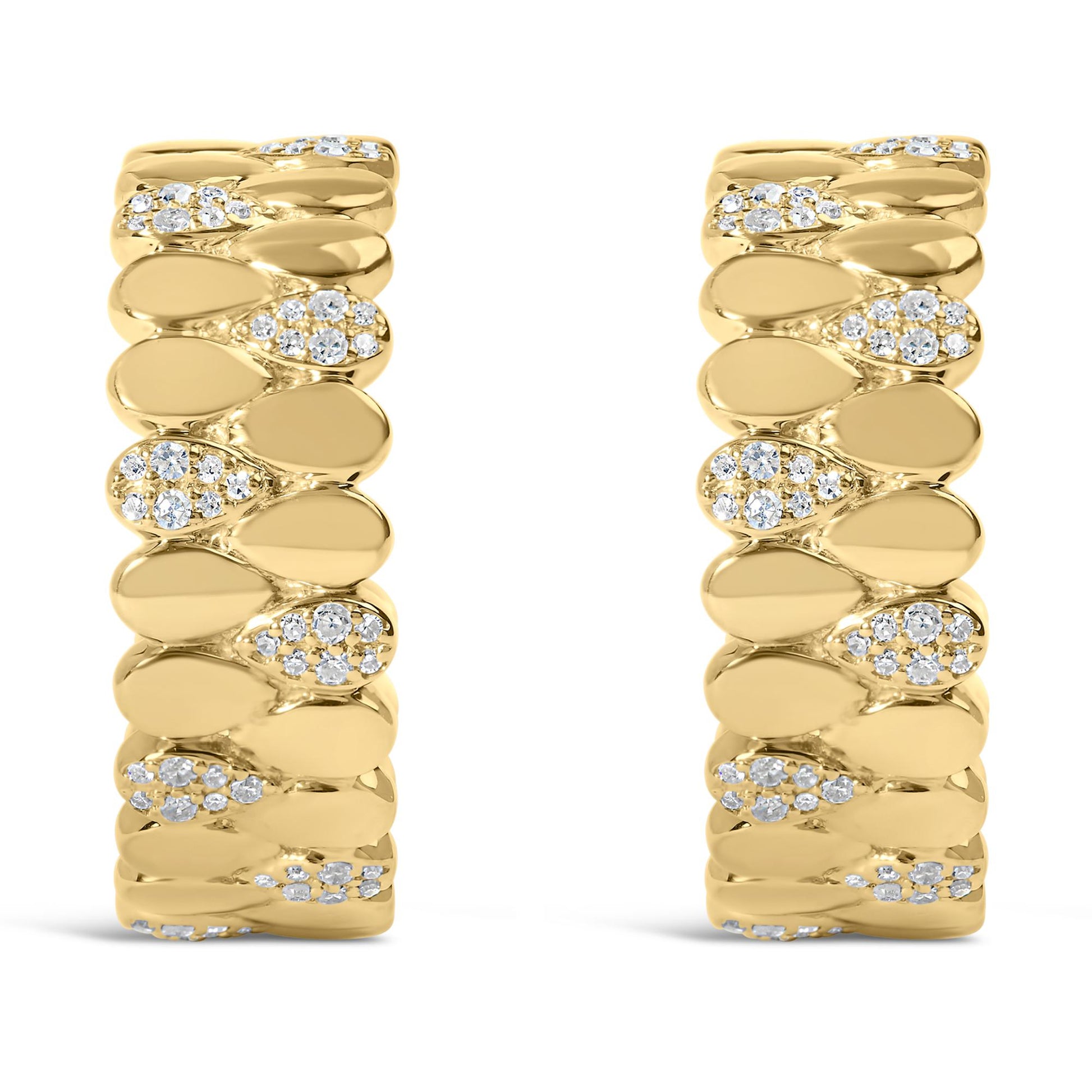 Front view of a pair of yellow metal earrings featuring an alternating pattern of smooth segments and segments set with round white gemstones in prong and pave settings.