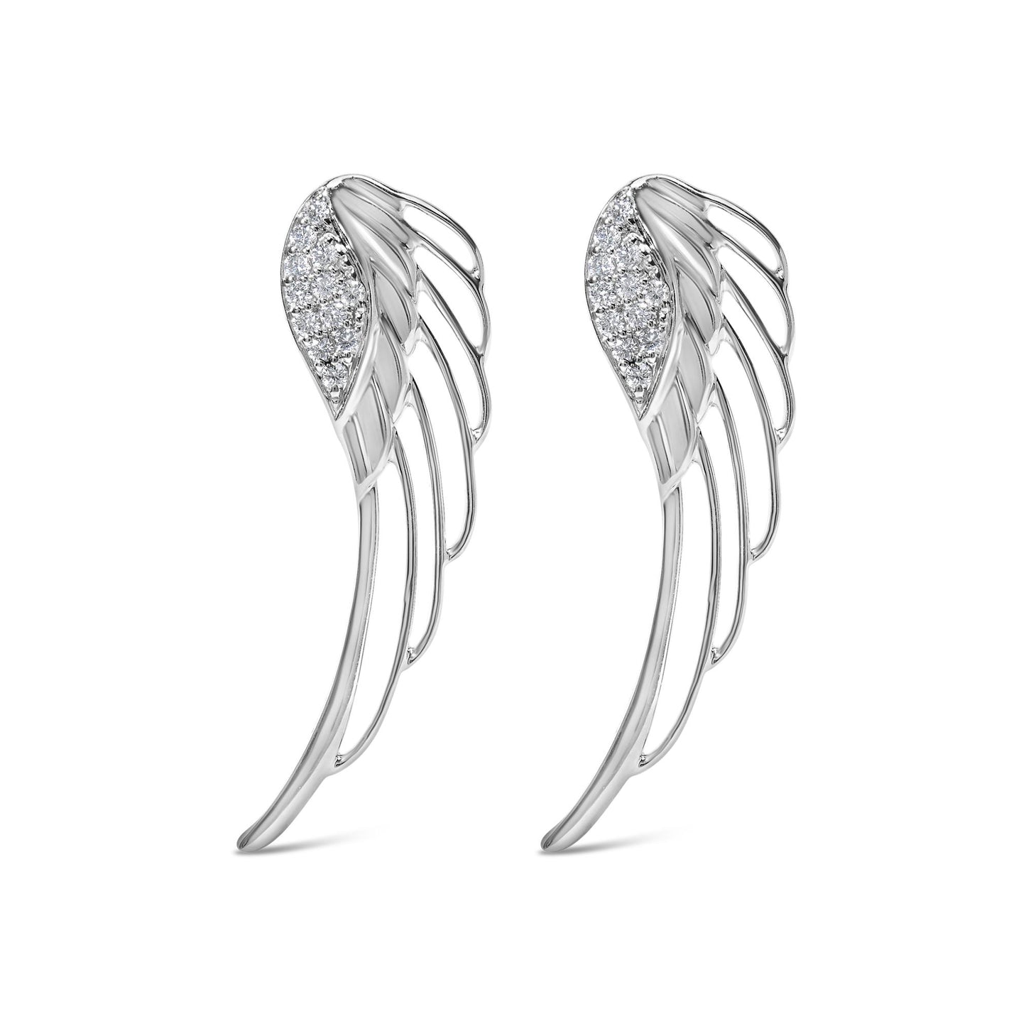 Pair of white metal earrings designed as stylized wings with curved lines and clusters of small round white gemstones, front-facing angle.