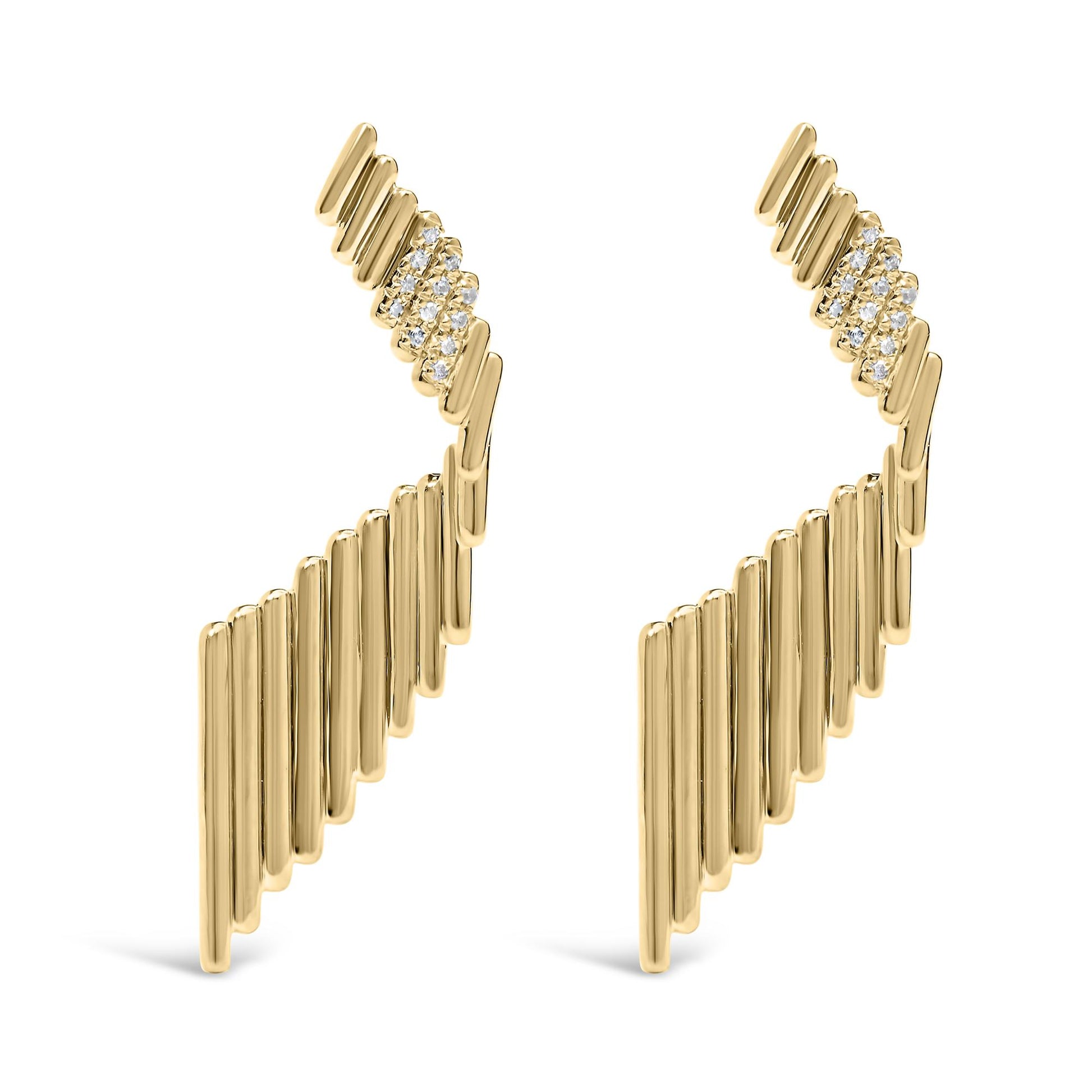 Pair of yellow metal earrings with vertical bar design and clusters of white round gemstones in prong setting, shown from front angle.