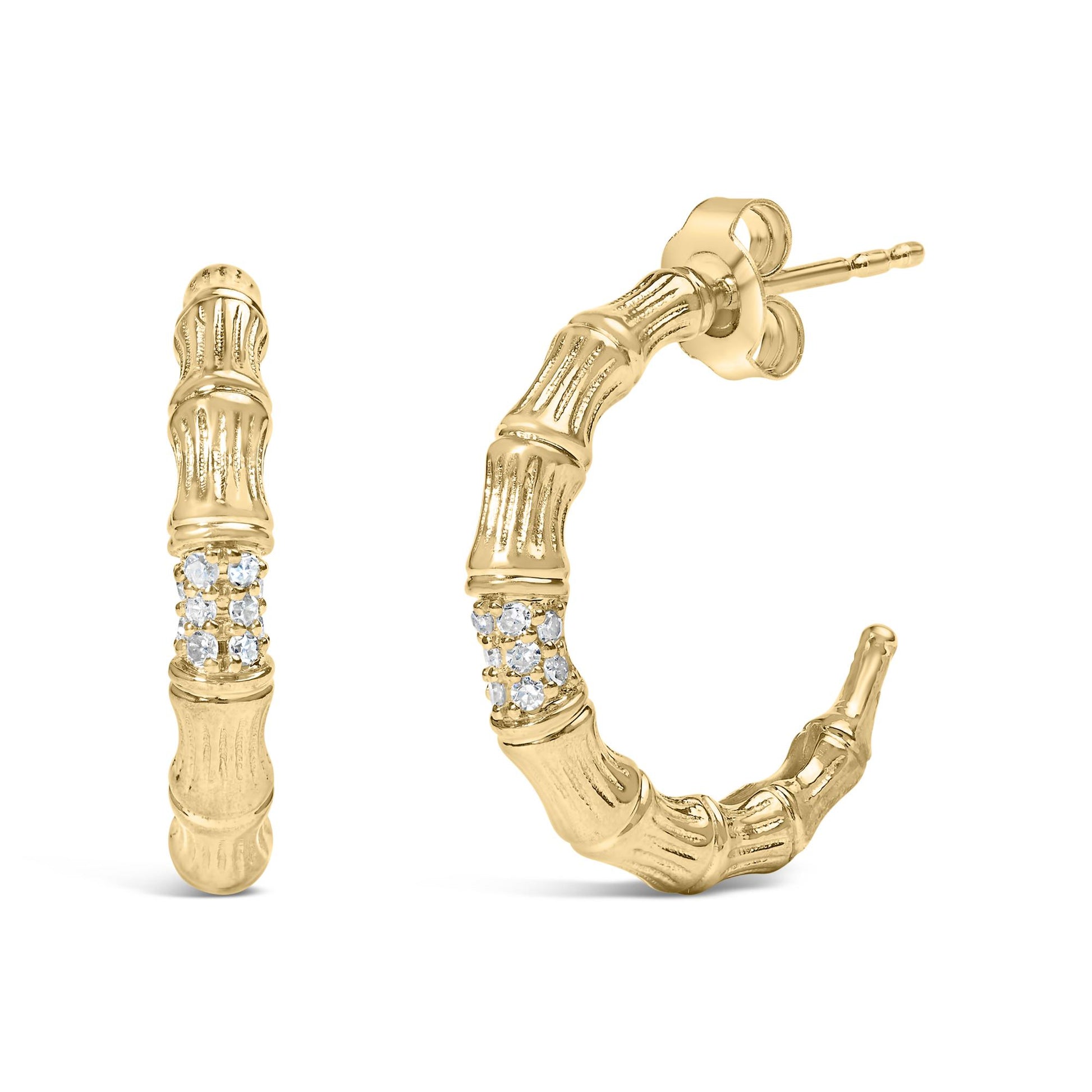 Pair of yellow metal hoop earrings with textured bamboo-like design and cluster of round white gemstones set in prongs, shown from front and side angles.