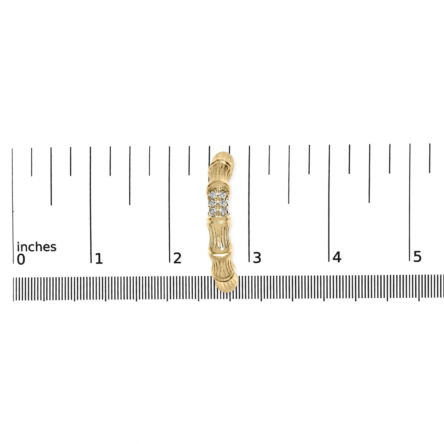 Single yellow metal earring with a row of round white gemstones, shown from the top on a ruler for size reference.