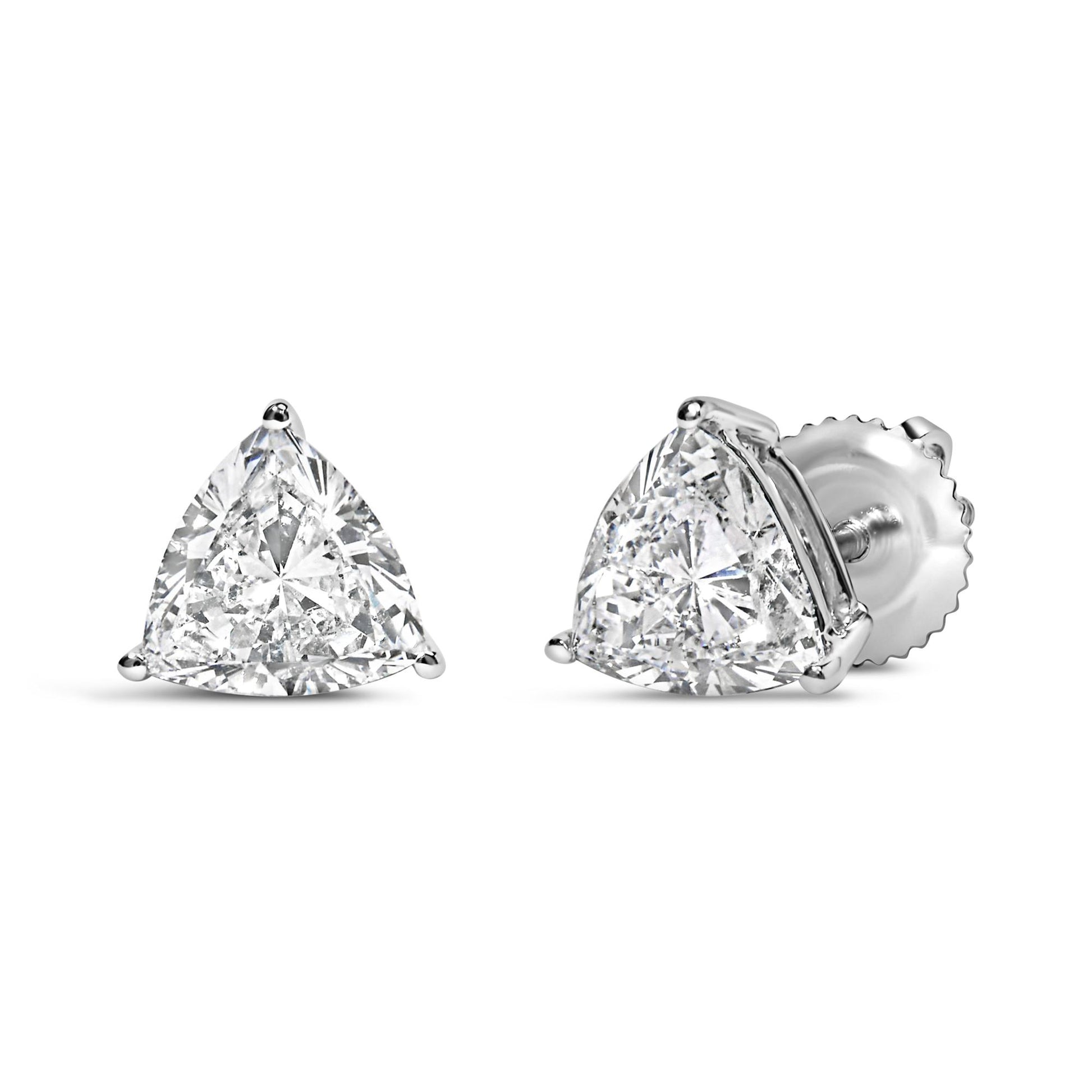 Pair of white metal stud earrings with trillion-shaped white gemstones in three-prong settings, shown from front and side angles.