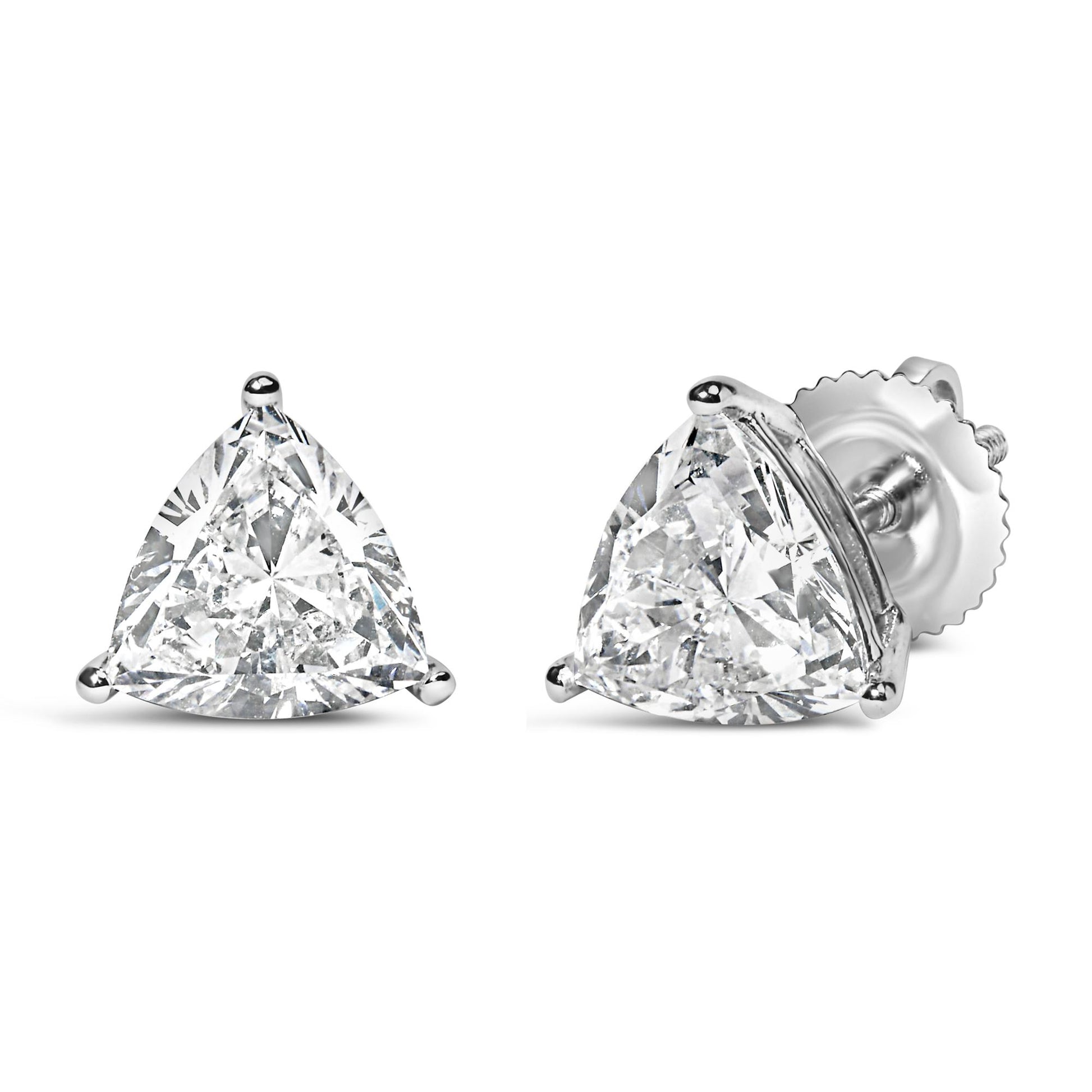 Pair of white metal stud earrings with trillion-shaped white gemstones in 3-prong settings, shown from front and angled side on a white background.