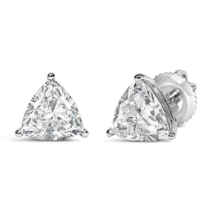 Pair of white metal stud earrings with trillion-shaped white gemstones in 3-prong settings, shown from front and angled side on a white background.