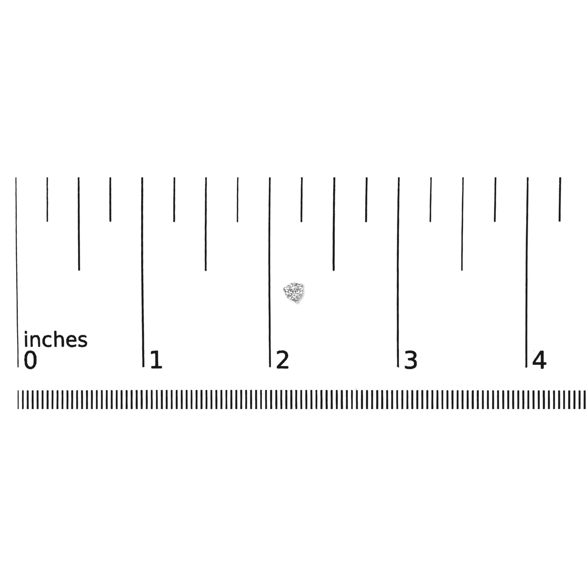 Close-up top view of a white metal earring with a round white gemstone in a 3-prong setting, placed on a ruler for size reference.