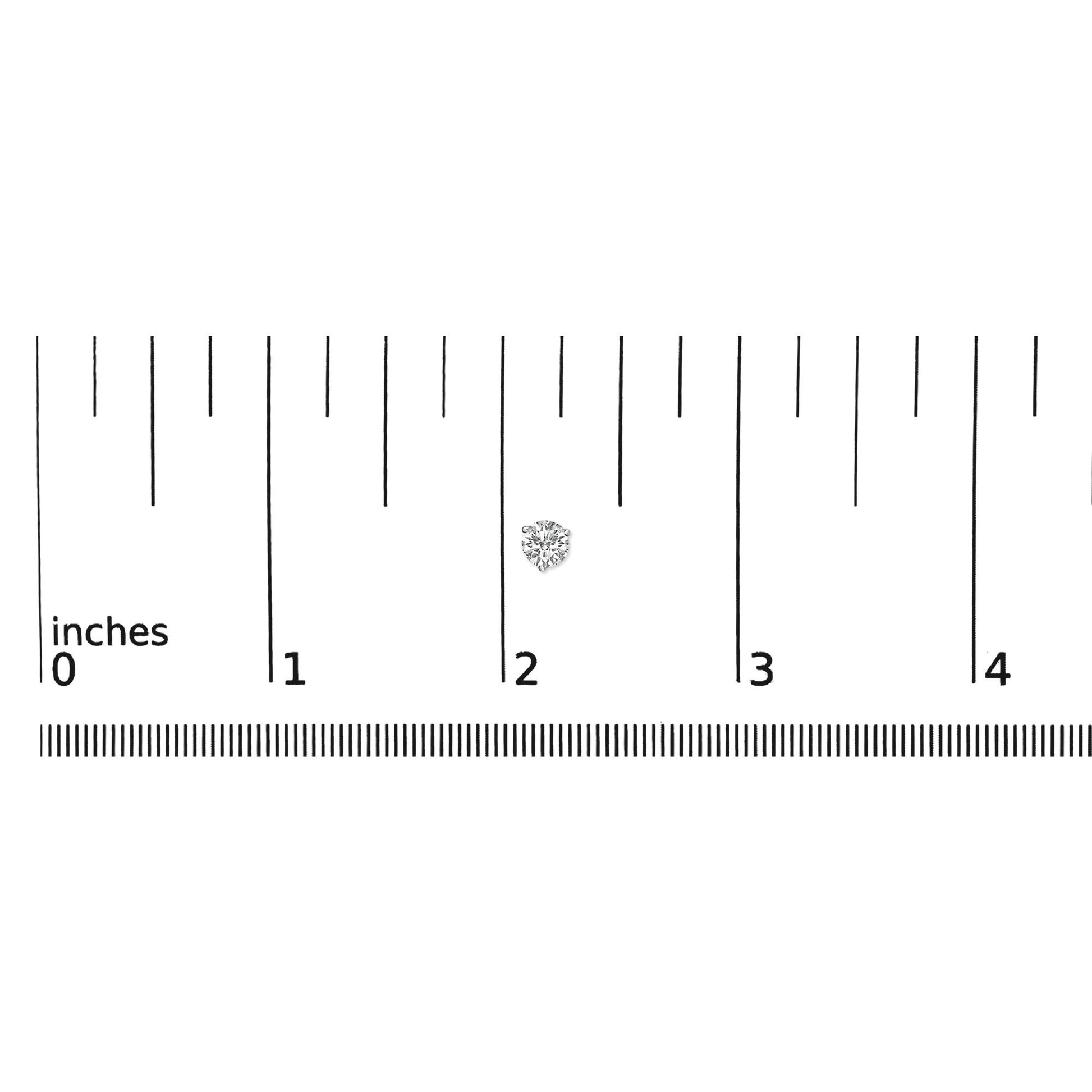 Close-up top view of a single white metal stud earring with a round white gemstone in 3-prong setting, placed on a ruler for size reference.
