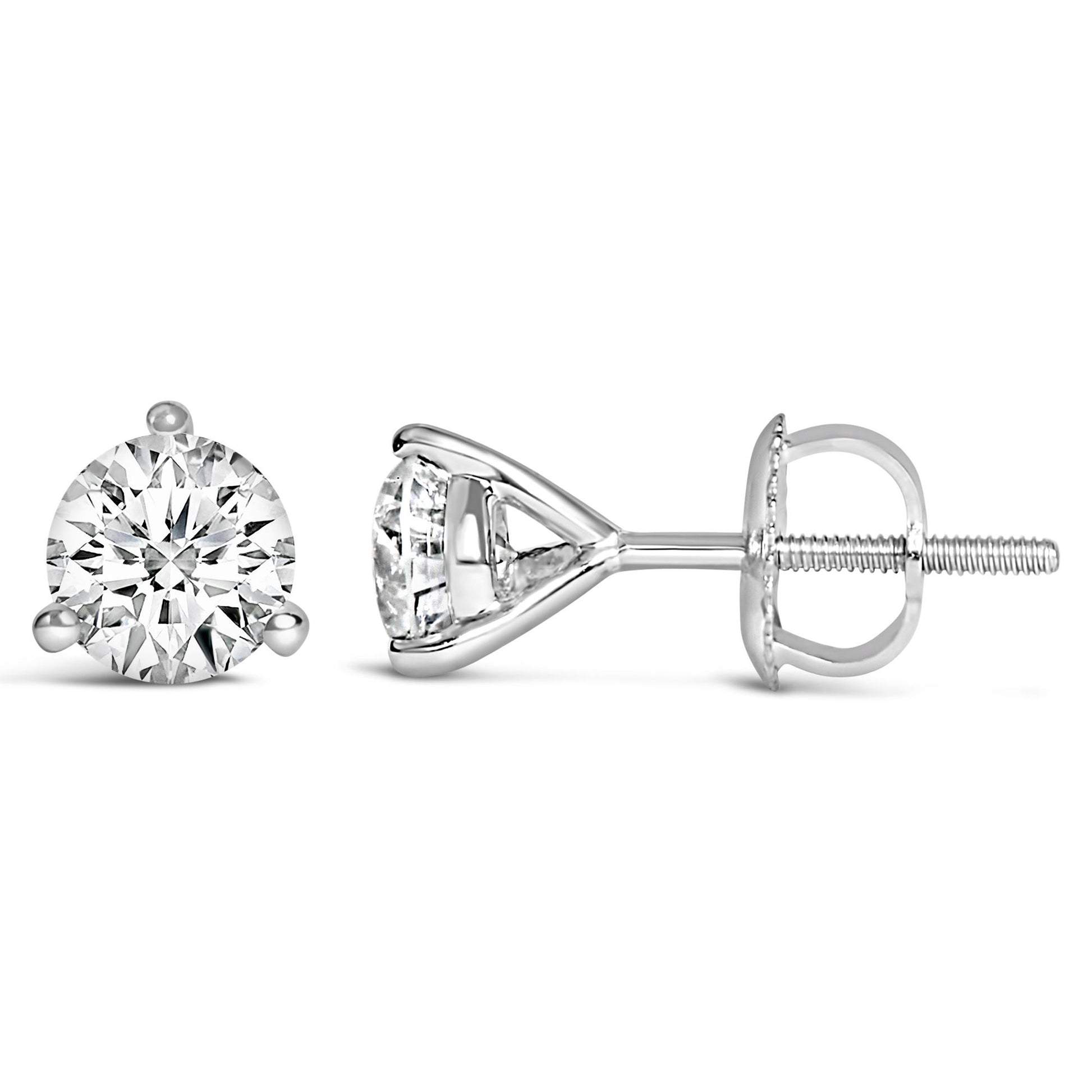 Front and side view of white metal stud earrings with round white gemstones in 3-prong settings on a white background.