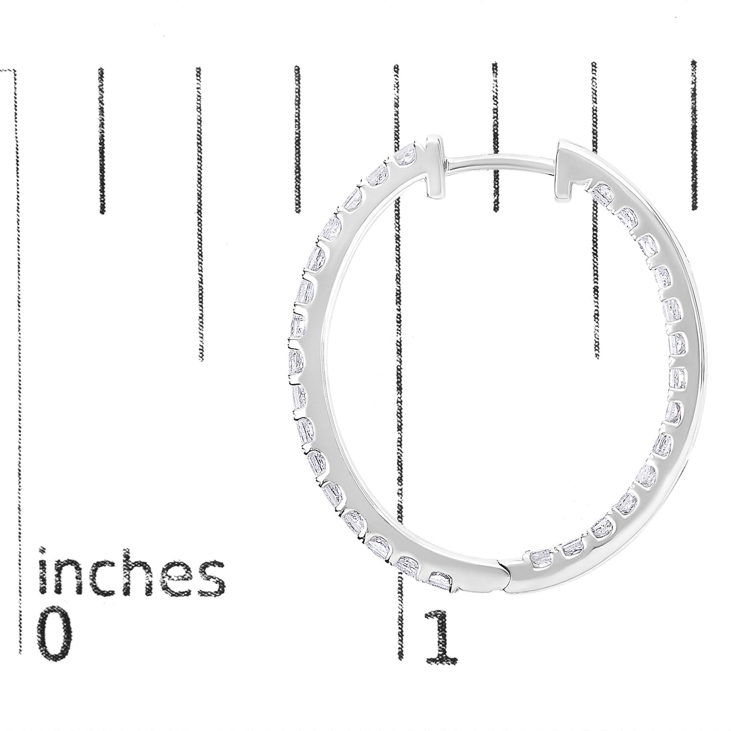 Close-up front view of a white metal hoop earring with white princess-shaped gemstones in prong settings, shown on a scale with inch markings.