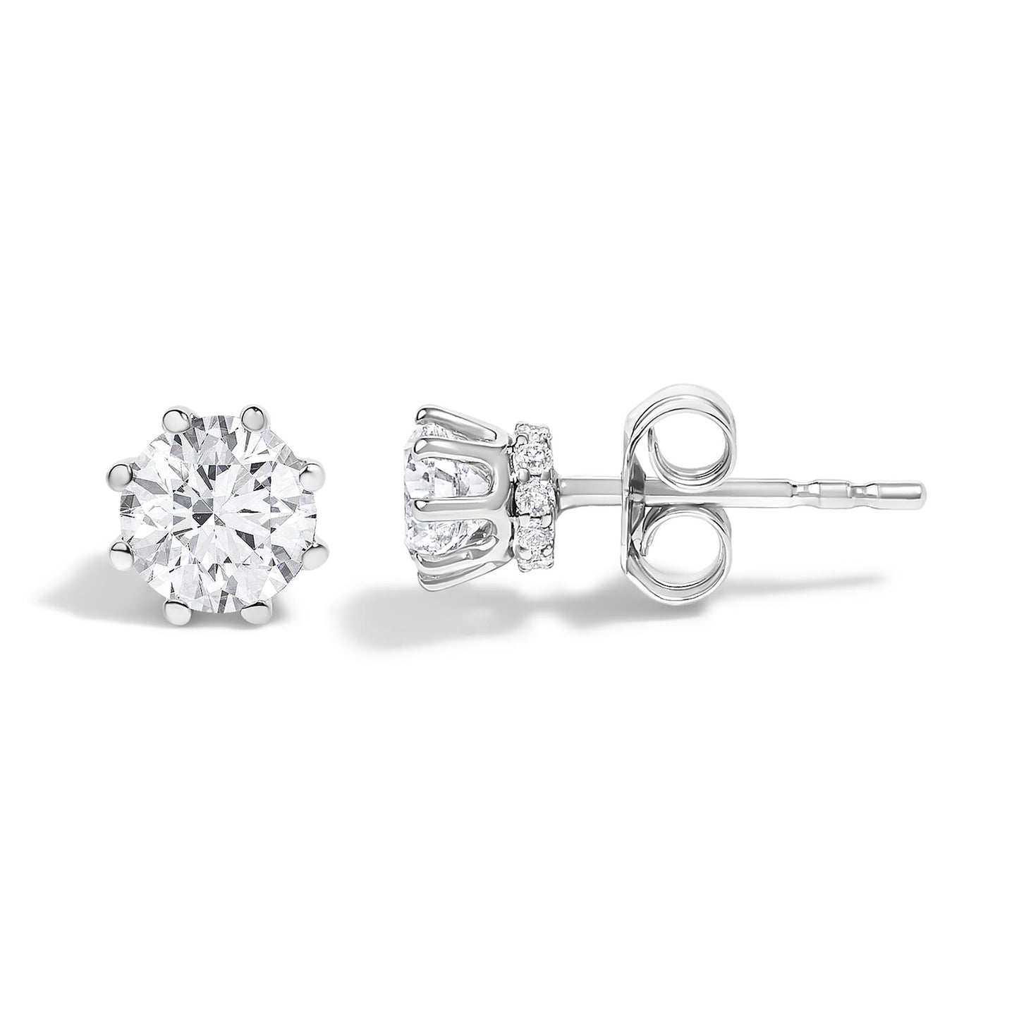 Pair of white metal stud earrings shown in front and side angles, featuring a large round white gemstone in a prong setting with smaller round white gemstones surrounding the base.