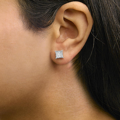 Close-up side view of a model wearing a white metal earring with multiple princess-shaped white gemstones in an invisible setting.