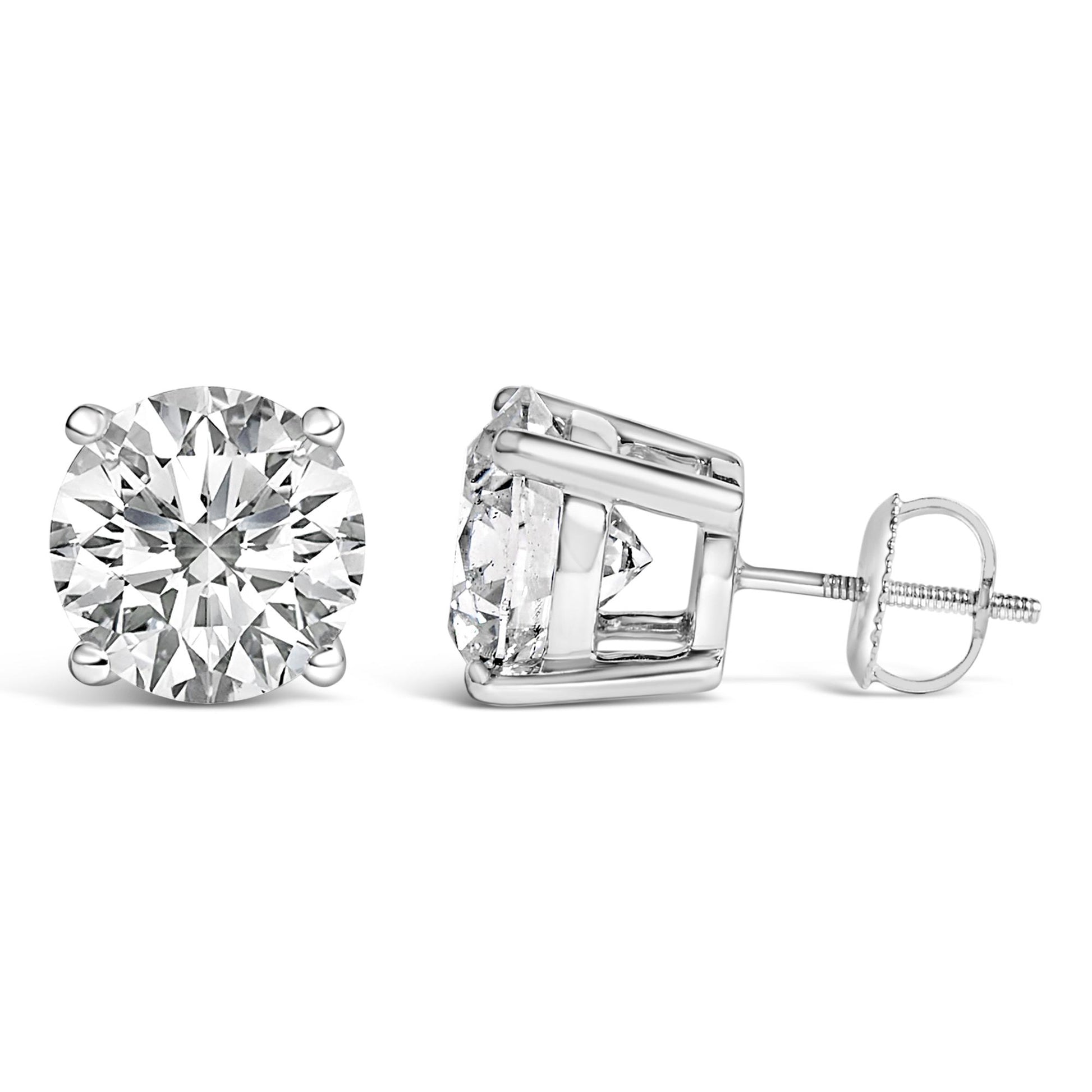Close-up front and side angle of white metal stud earrings with round white gemstones in 4-prong settings.
