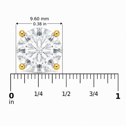 Close-up front view of a round white gemstone earring with four yellow metal prongs, shown on a scale with measurements in inches and millimeters.