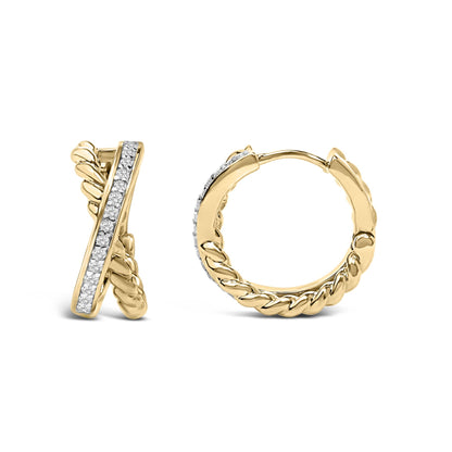 Close-up front angle of a pair of yellow hoop earrings with a twisted design and a row of round white gemstones set in prongs along the front.