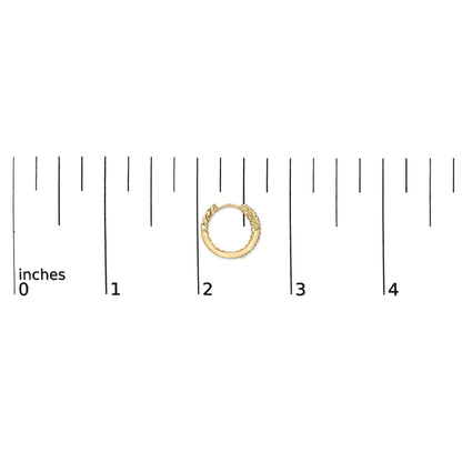 Close-up overhead view of a single yellow metal hoop earring with a twisted design and small white gemstones set in prongs along the outer edge, shown on a scale in inches.