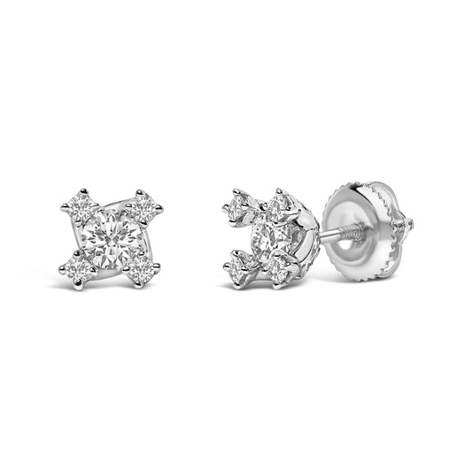 Pair of white metal stud earrings shown from front and side angles, each featuring one central round white gemstone surrounded by four smaller round white gemstones in prong settings.