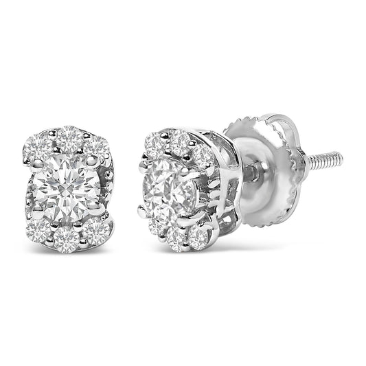 Close-up front and side view of white metal stud earrings with round white gemstones in prong settings arranged with a larger central gemstone surrounded by smaller gemstones.