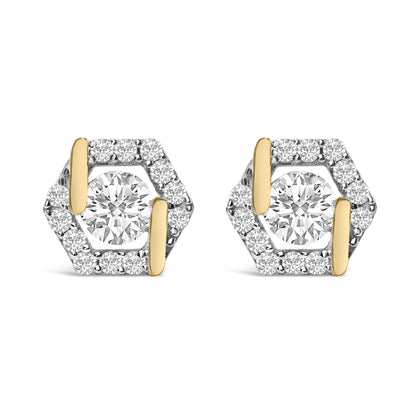 Pair of yellow metal hexagonal earrings with a large round white gemstone in the center, surrounded by smaller round white gemstones, shown in a front-facing close-up view.