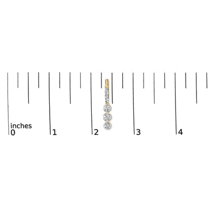 Close-up image of a single yellow metal earring shown on a scale, featuring a vertical bar with prong-set round white gemstones and three larger bezel-set round white gemstones hanging below.