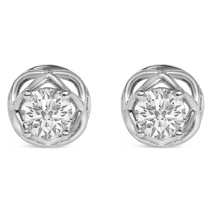 Close-up front view of a pair of white metal round stud earrings with white gemstones in prong settings.