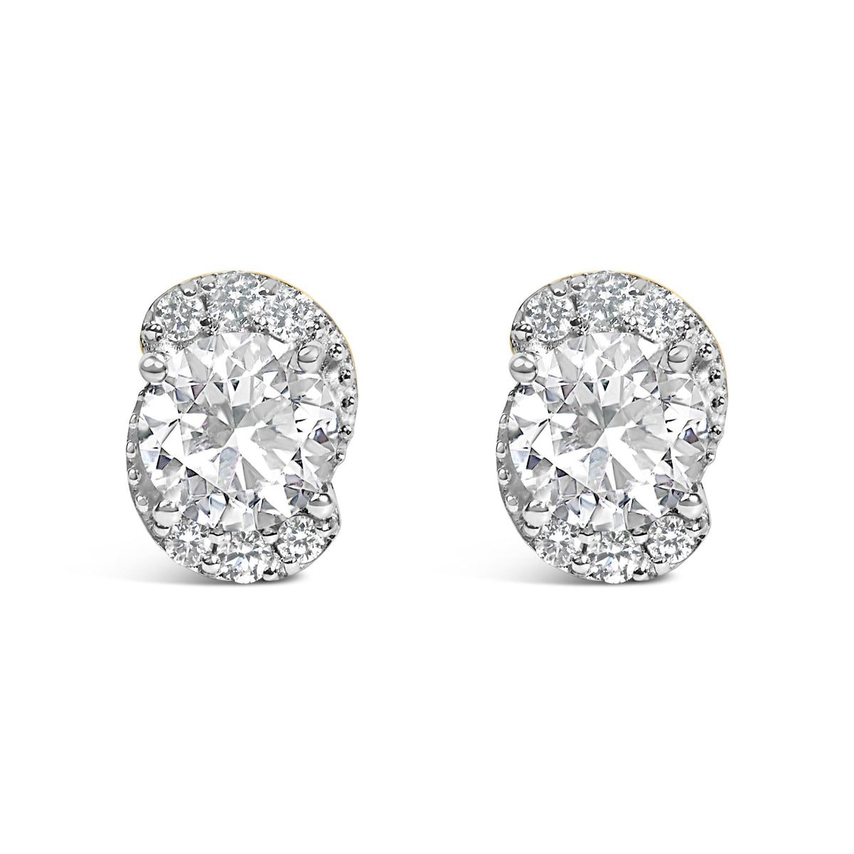 Close-up front view of a pair of yellow metal earrings with large round white gemstone centers surrounded by smaller round white gemstones in prong settings.