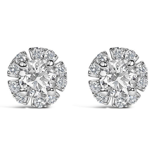Angled view of 10K yellow gold plated sterling silver floral halo stud earrings with lab-grown diamonds on white