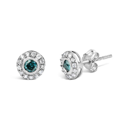 Close-up front and side angle of white metal round stud earrings with blue gemstone centers surrounded by white gemstones in prong settings.