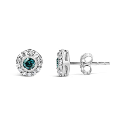 Close-up image of round white metal stud earrings with a central blue gemstone surrounded by smaller white gemstones in a prong setting, shown from the front and side angles on a white background.
