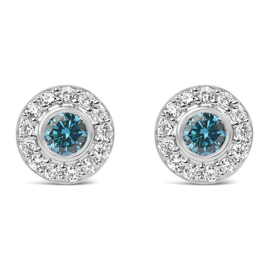Front view of Sterling Silver 1.0 Cttw blue and white lab grown diamond round halo stud earrings on white background