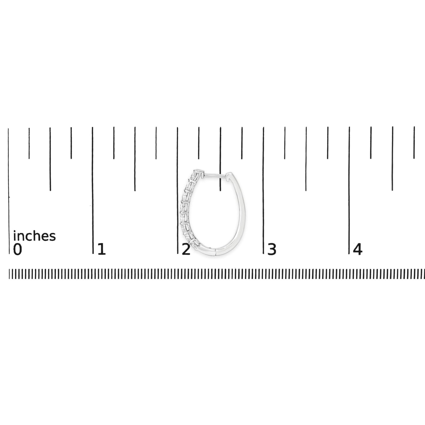 White metal hoop earring with round white gemstones set along one side, shown on a scale from a front angle.