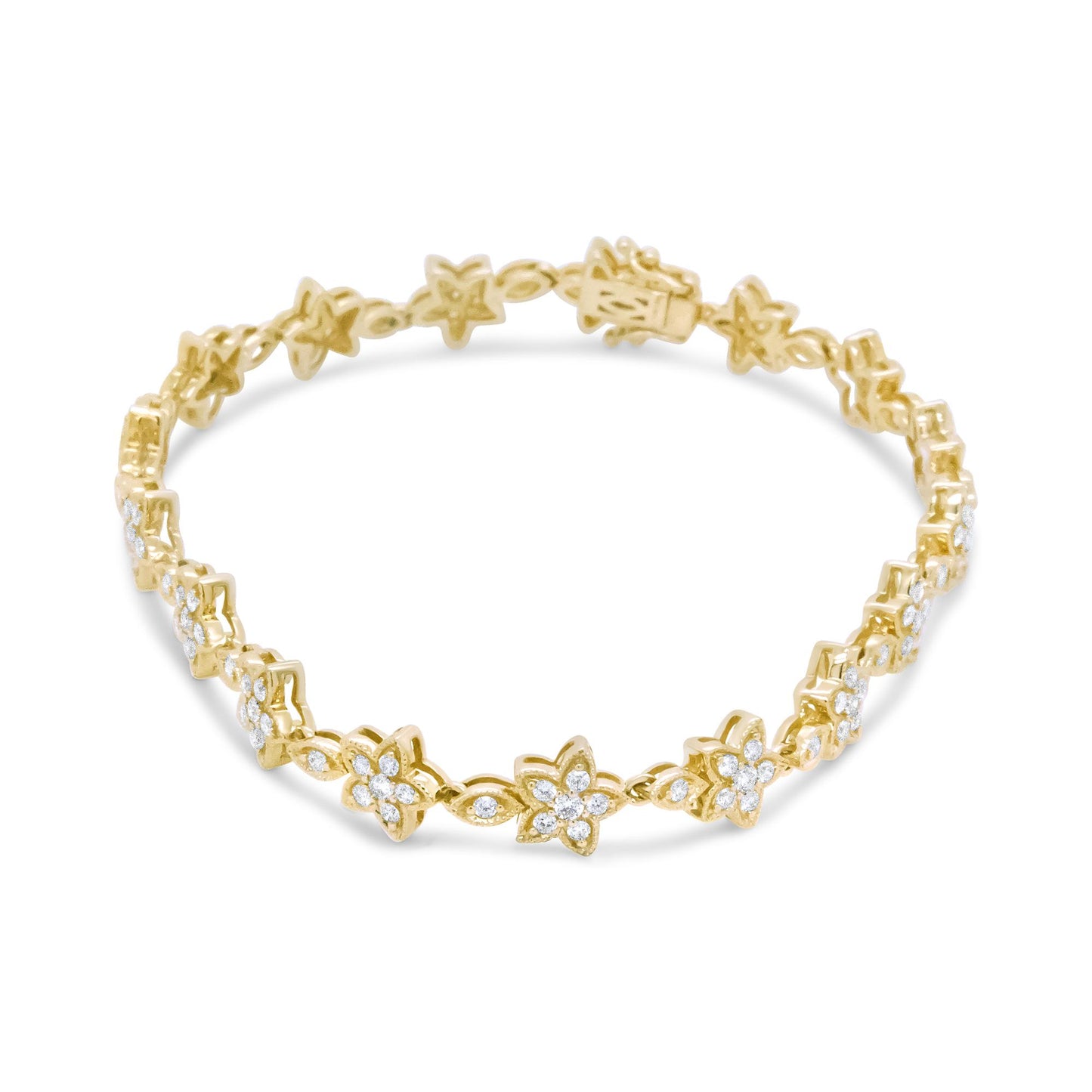 Yellow metal bracelet with flower and leaf shapes adorned with white gemstones, shown in a front angled view.