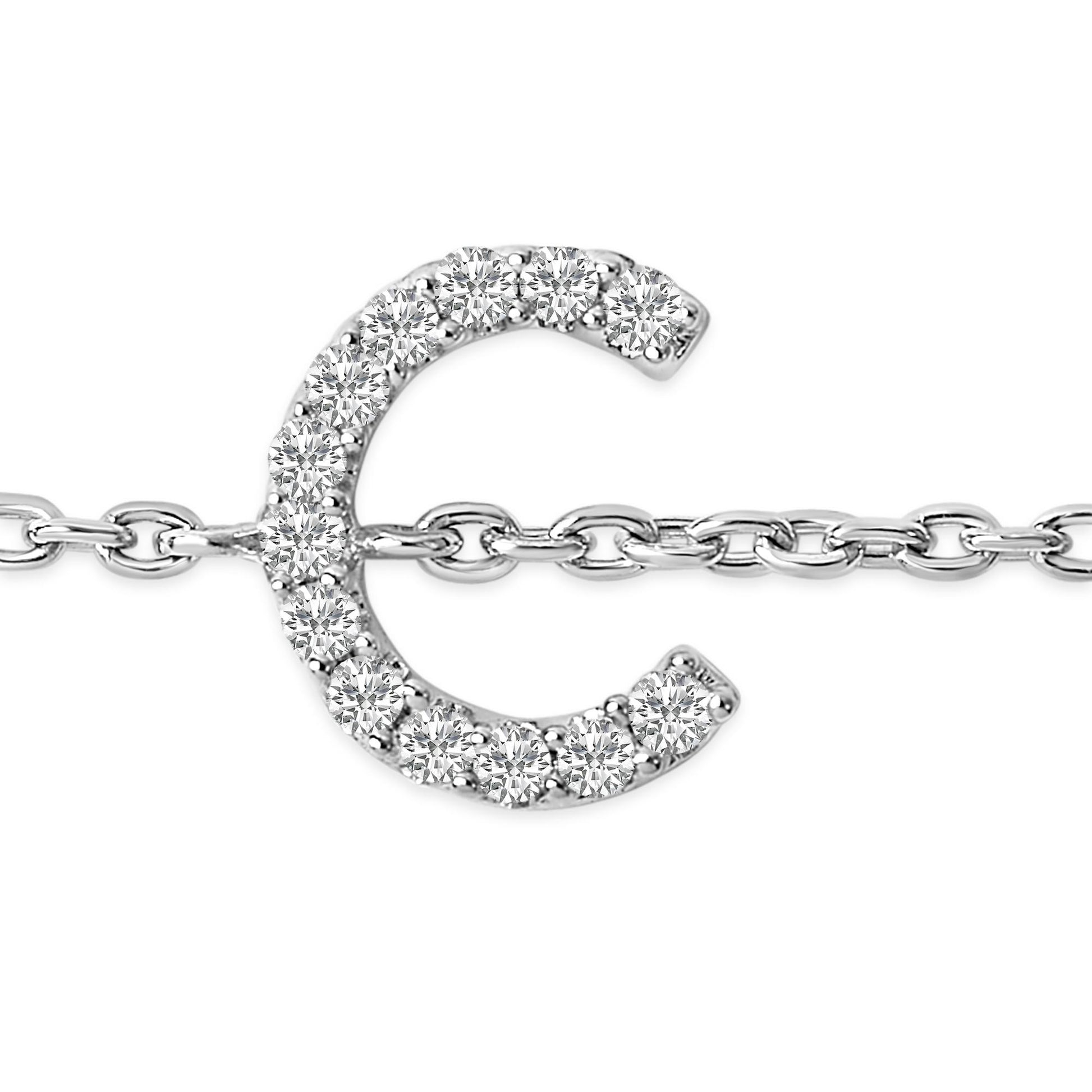 Close-up front view of a white bracelet featuring a curved design set with round white gemstones in a micro-pave setting, attached to a delicate chain.