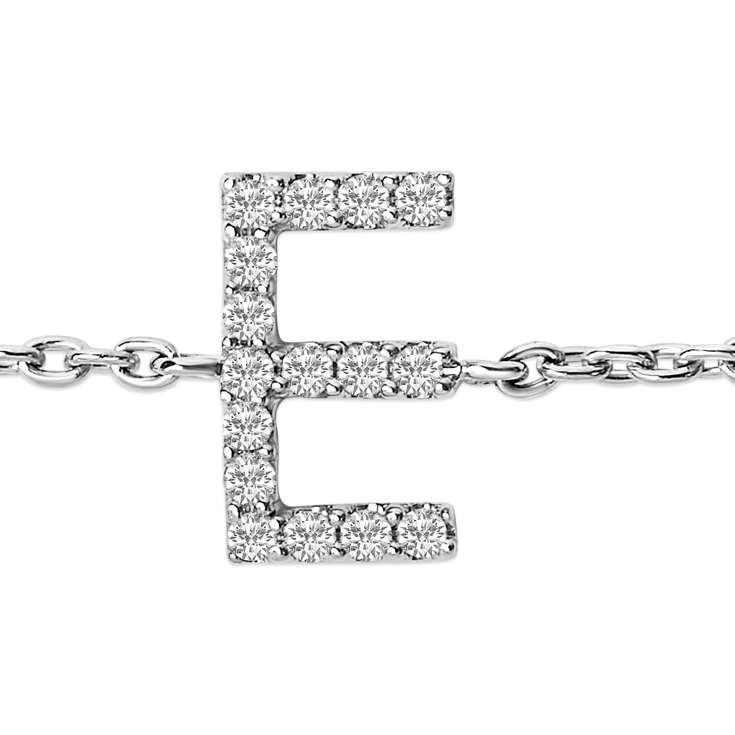 Close-up front view of a white bracelet with a letter 'E' pendant adorned with round white gemstones in a micro-pave setting, attached to a linked chain.