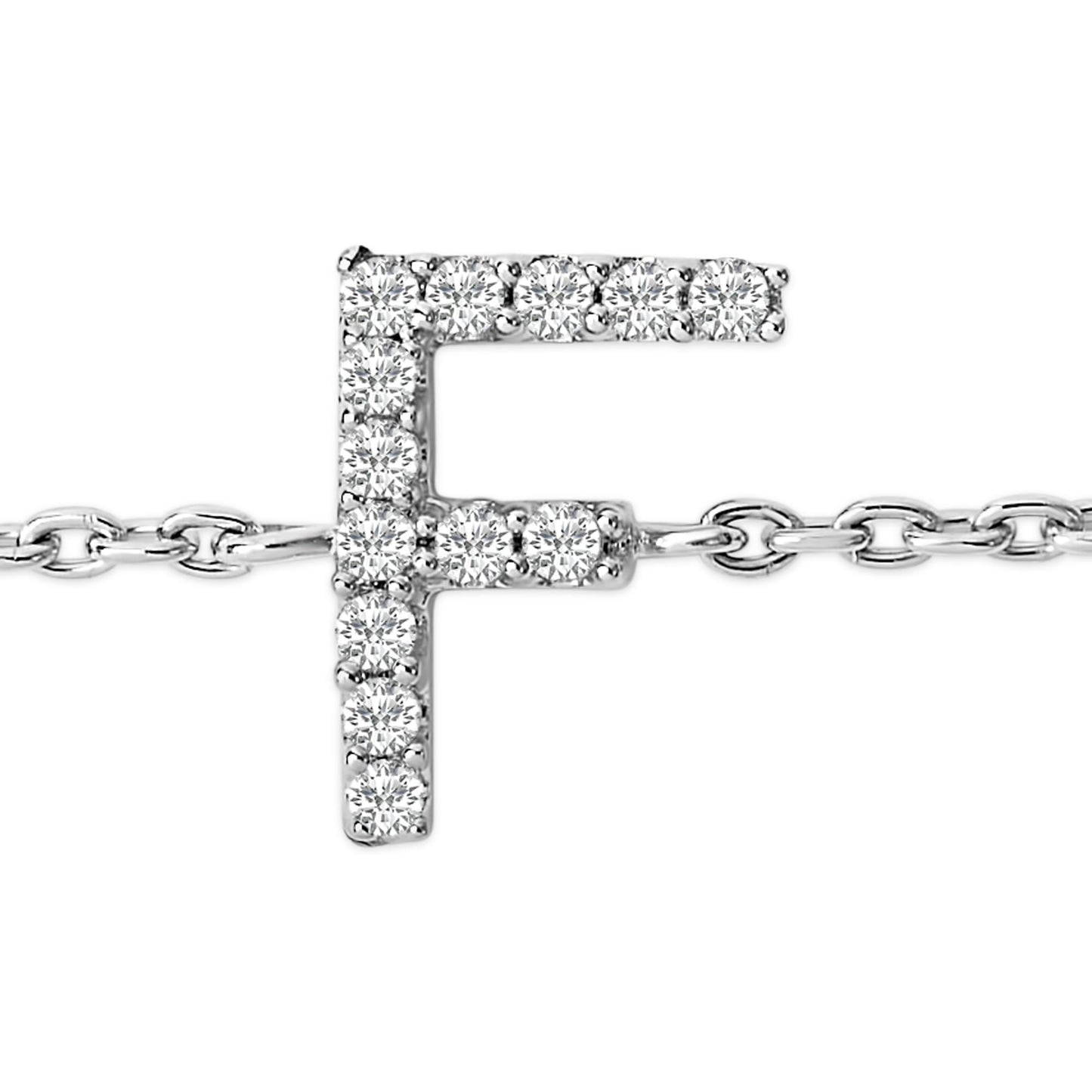 Close-up front angle of a white metal bracelet featuring a pendant in the shape of the letter 'F' adorned with white gemstones in a micro-pave setting, shown against a white background.