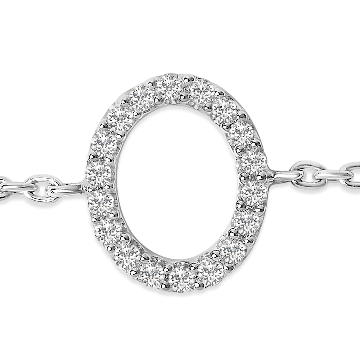 Close-up front view of a white metal bracelet featuring an oval-shaped centerpiece adorned with round white gemstones in a micro-pave setting, shown on a white background.