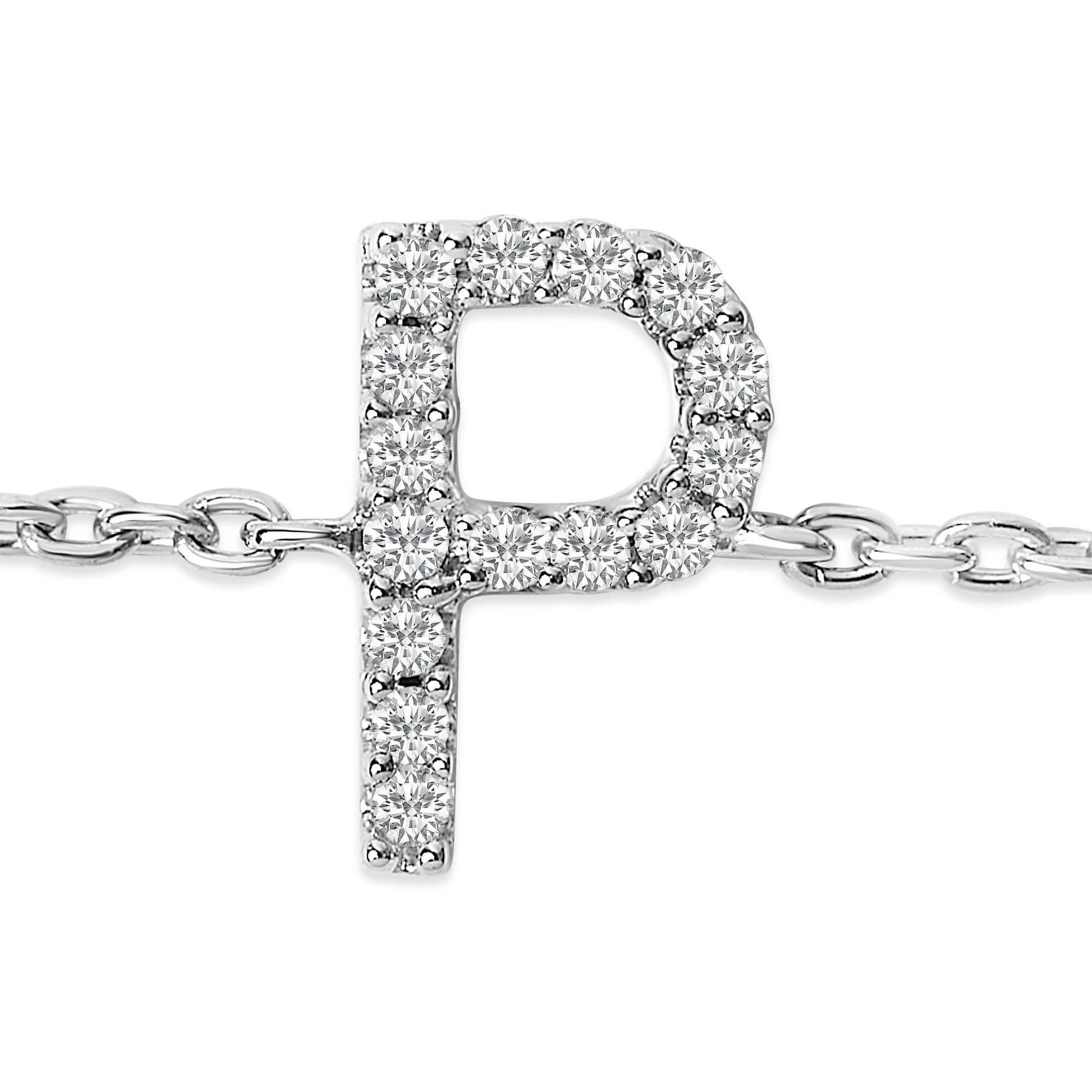 Close-up front angle of a white bracelet featuring a pendant in the shape of the letter 'P' adorned with round white gemstones in a micro-pave setting.
