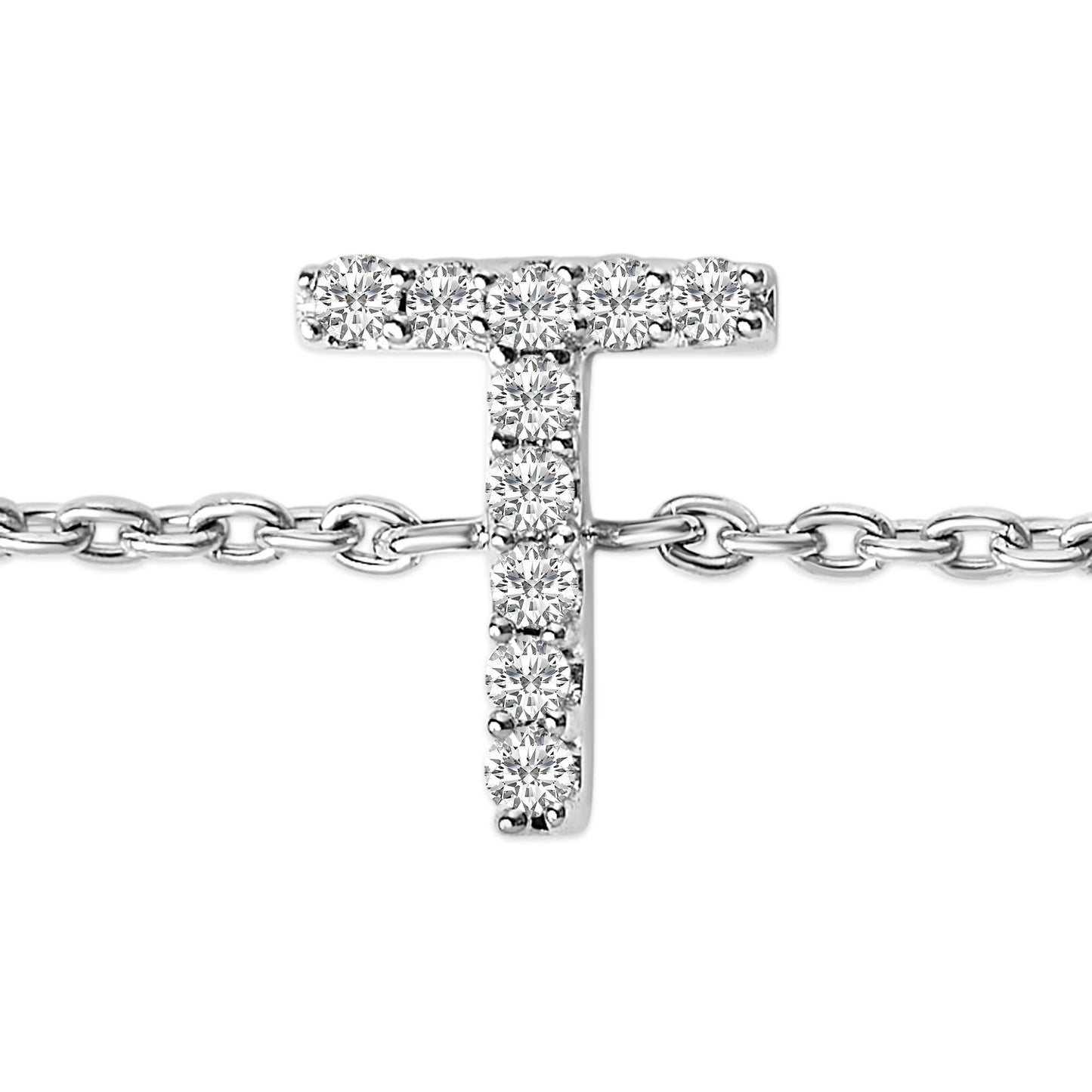 Close-up front view of a white metal bracelet featuring a T-shaped centerpiece adorned with round white gemstones in a micro-pave setting, shown on a white background.