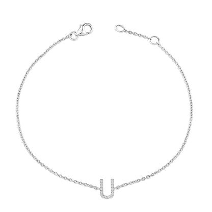 White metal bracelet with a delicate chain and a central U-shaped pendant adorned with round white gemstones in a micro-pave setting, shown from a top-down angle.