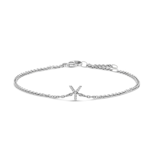 White metal bracelet with an X-shaped centerpiece set with small white gemstones, shown from a front angle on a white background.