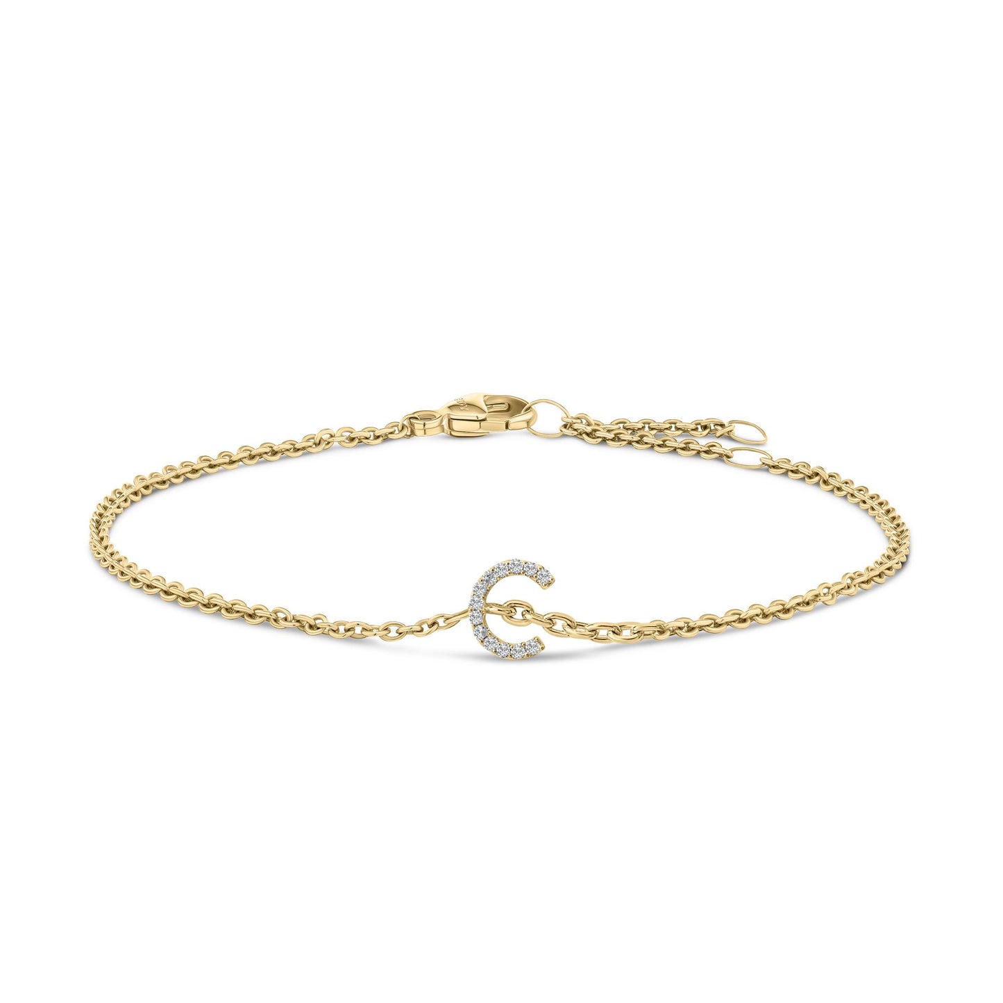 Yellow metal bracelet with a curved design element set with small white gemstones, displayed flat on a white background from a top front angle.