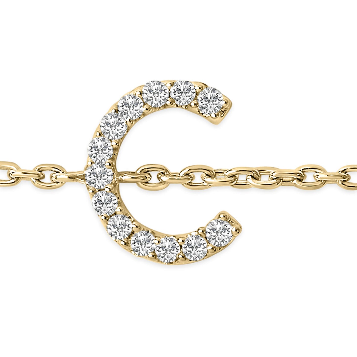 Close-up front angle of a yellow metal bracelet featuring a crescent-shaped charm adorned with round white gemstones in a micro-pave setting, attached to a chain link.