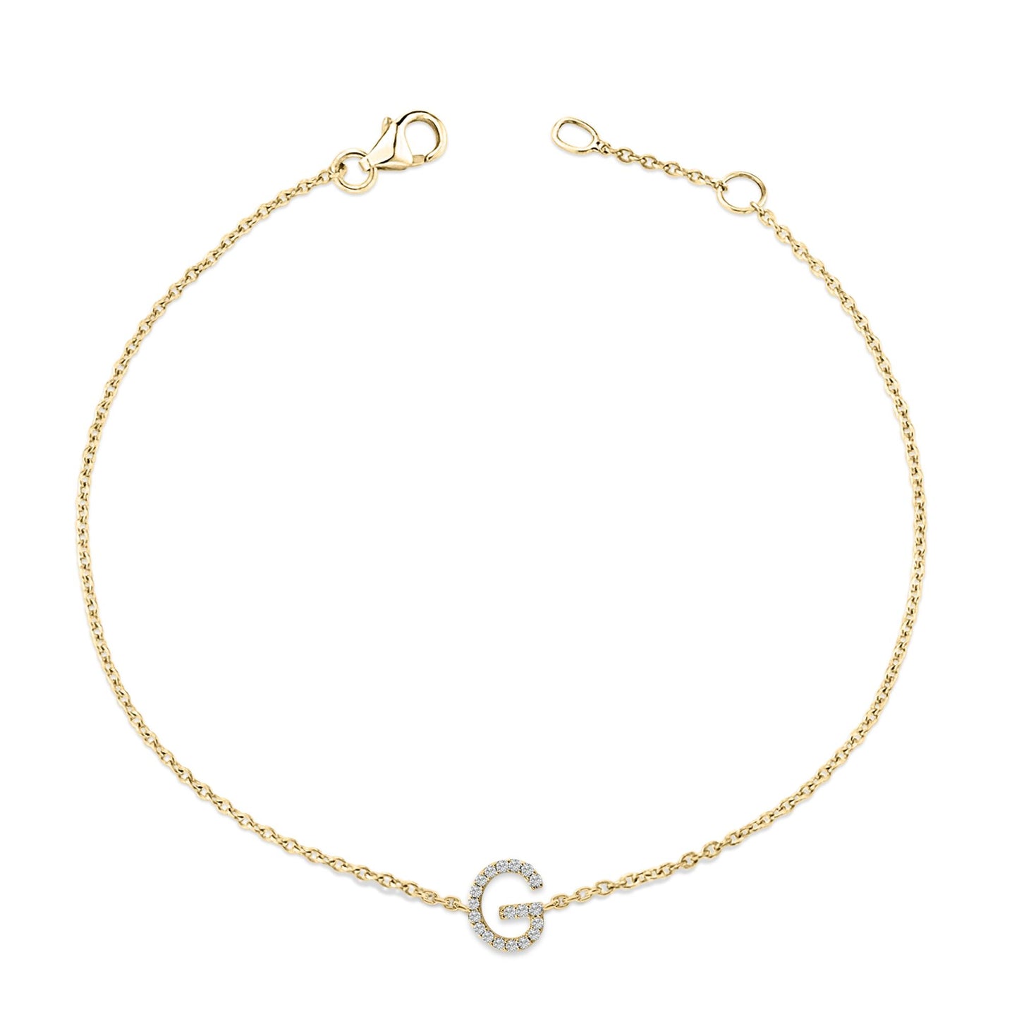 Yellow metal bracelet with a circular link chain and a central letter-shaped charm embellished with small white gemstones, shown flat from a top-down angle.