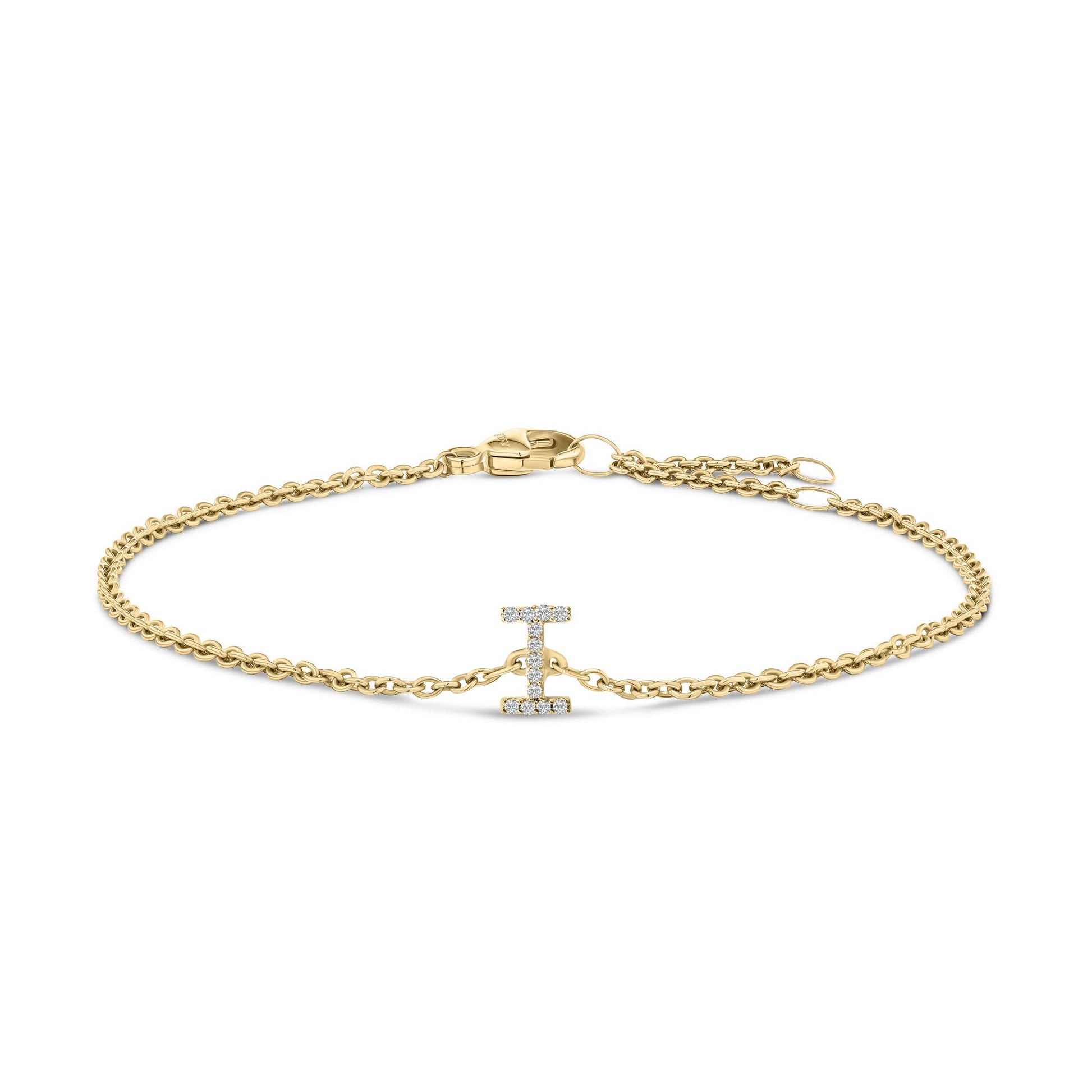 Yellow bracelet with a double chain and a horizontal bar centerpiece set with white gemstones, shown from a front-facing, flat-lay angle.
