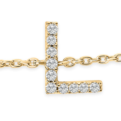 Close-up front angle of a yellow bracelet featuring an L-shaped pendant adorned with round white gemstones in a micro-pave setting.