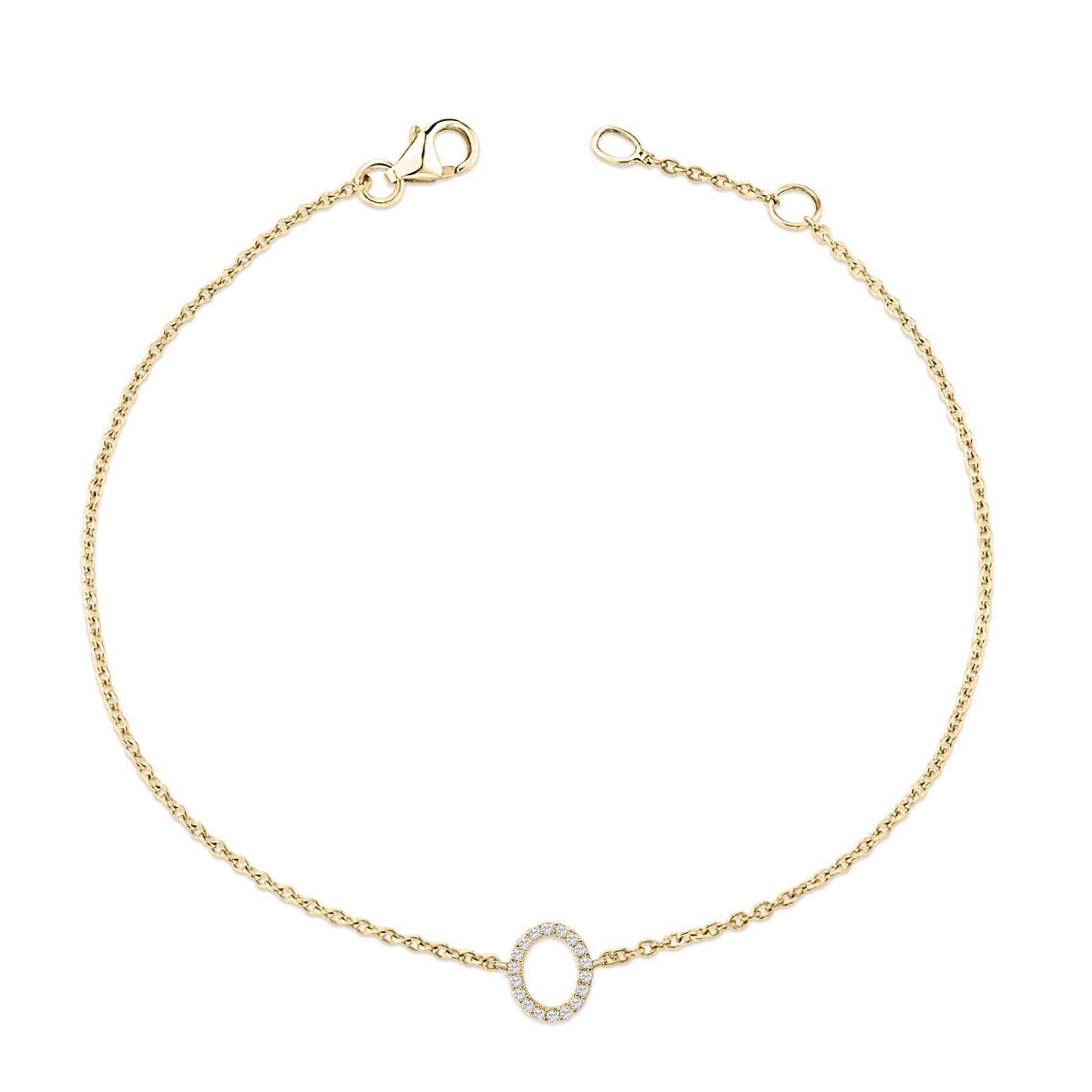 Yellow metal bracelet with a delicate chain and an oval centerpiece featuring white round gemstones in a micro-pave setting, shown flat from above.