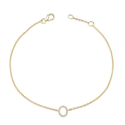 Yellow metal bracelet with a delicate chain and an oval centerpiece featuring white round gemstones in a micro-pave setting, shown flat from above.